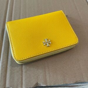 Small yellow Tory Burch Wallet.